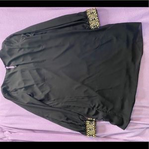 Black dress with gold rhinestones